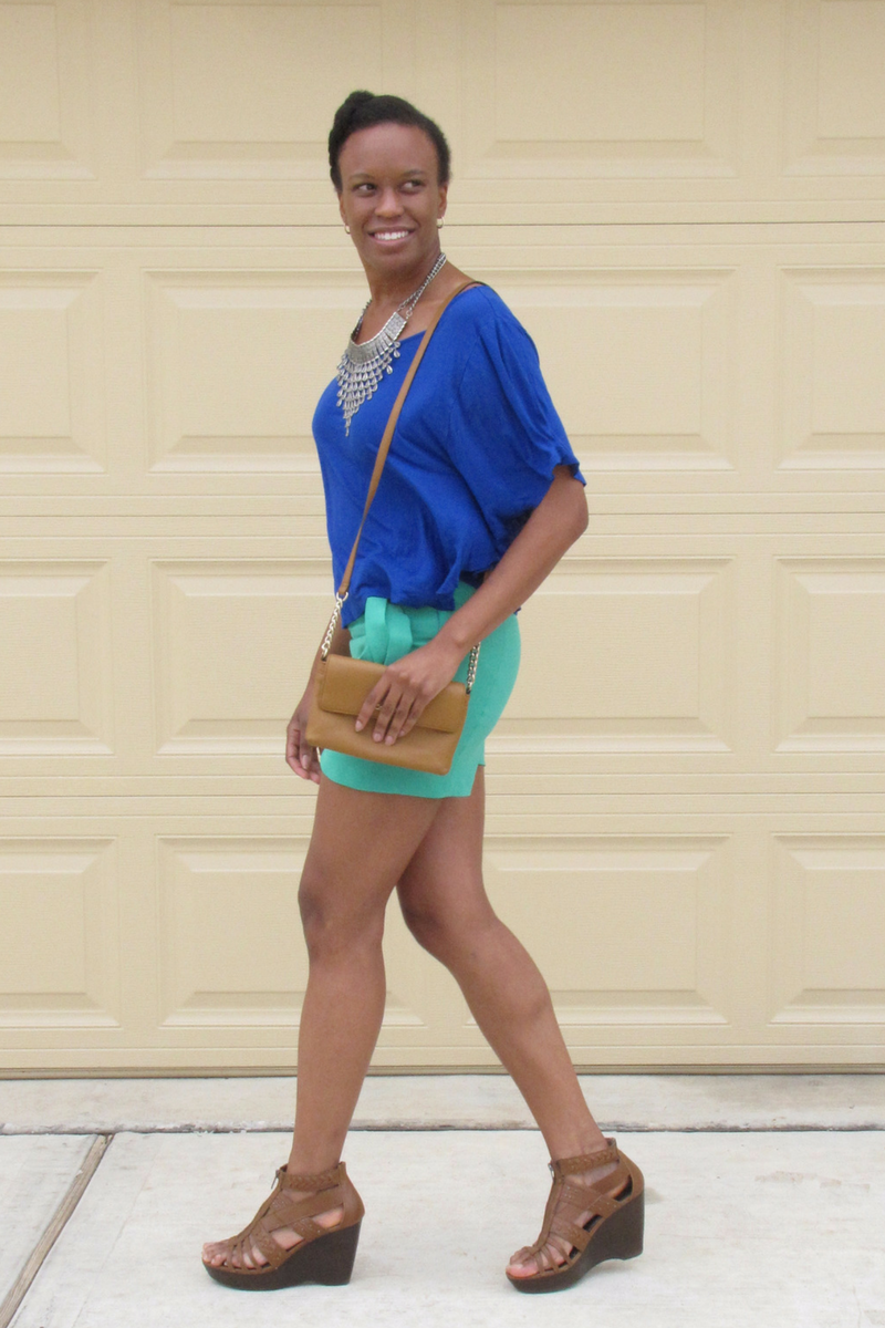blue blouse and green shorts 
